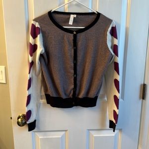 SI-IAE brand gray sweater with purple hearts on the sleeve. Women's size Large.